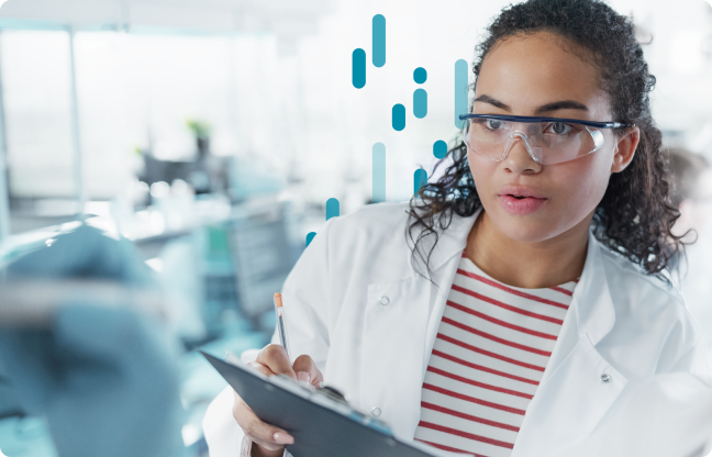 A medical professional wearing lab goggles holds a clipboard
